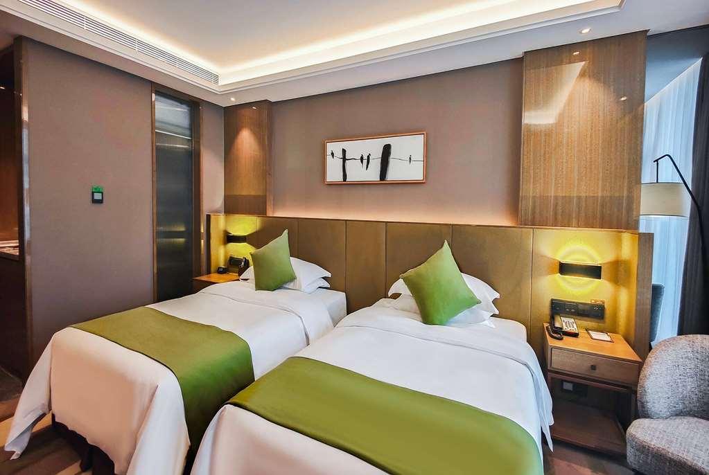 Leshan Ramada Hotel Oda fotoğraf