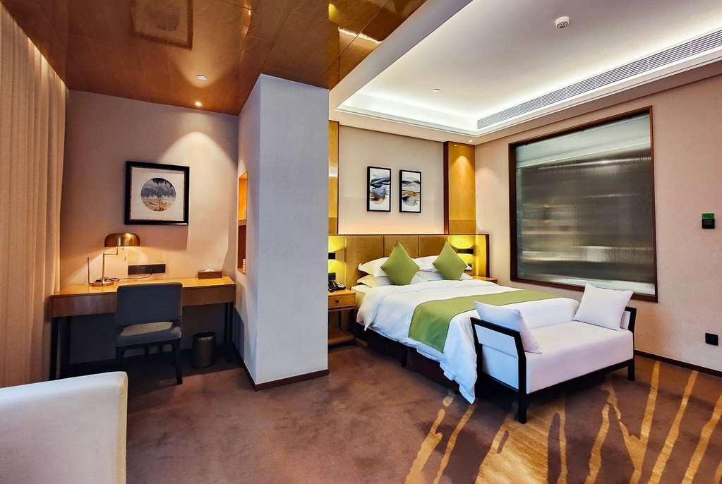 Leshan Ramada Hotel Oda fotoğraf